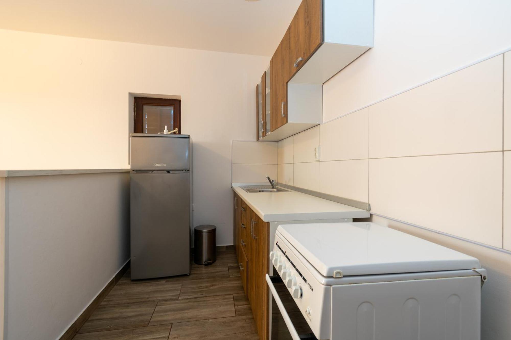 Apartments By The Sea Mandre, Pag - 3084 Kolan Bilik gambar